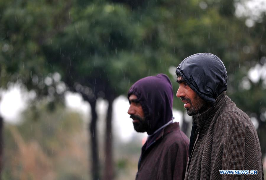 KASHMIR-JAMMU-WEATHER-RAIN