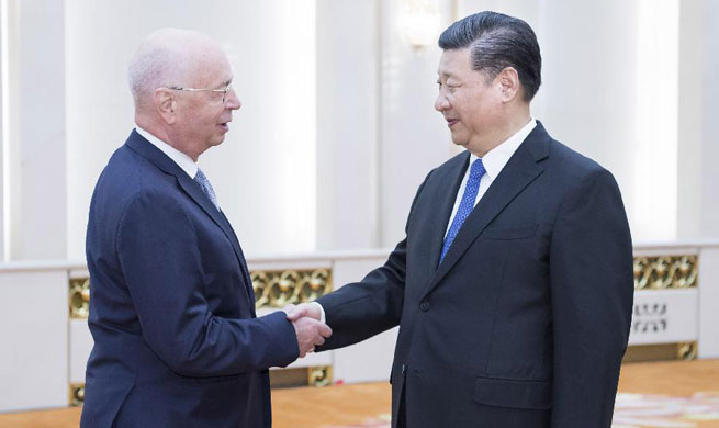 President Xi meets with WEF executive chairman