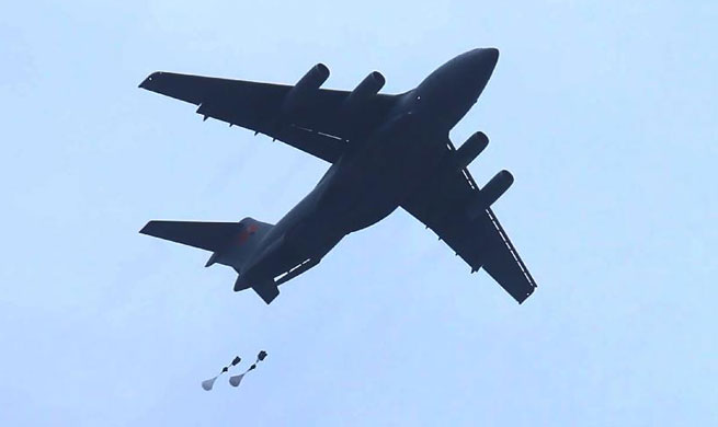 Y-20 heavy transport aircraft conducts first airborne, air delivery training